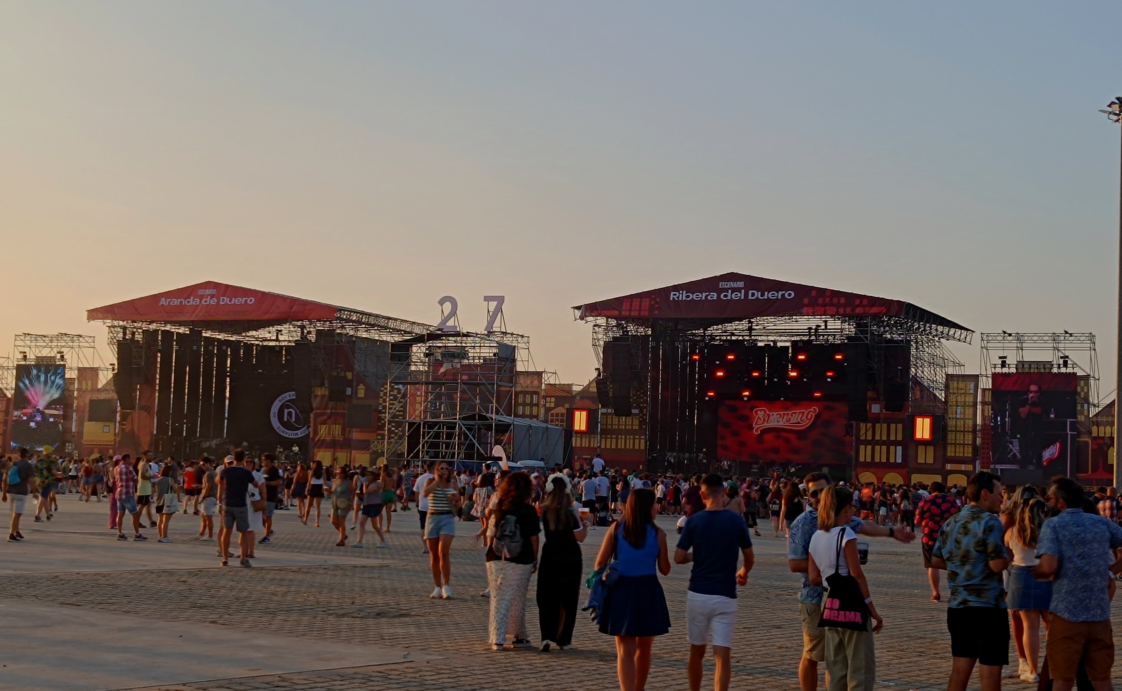 Stages at dusk during an outdoor indie music festival