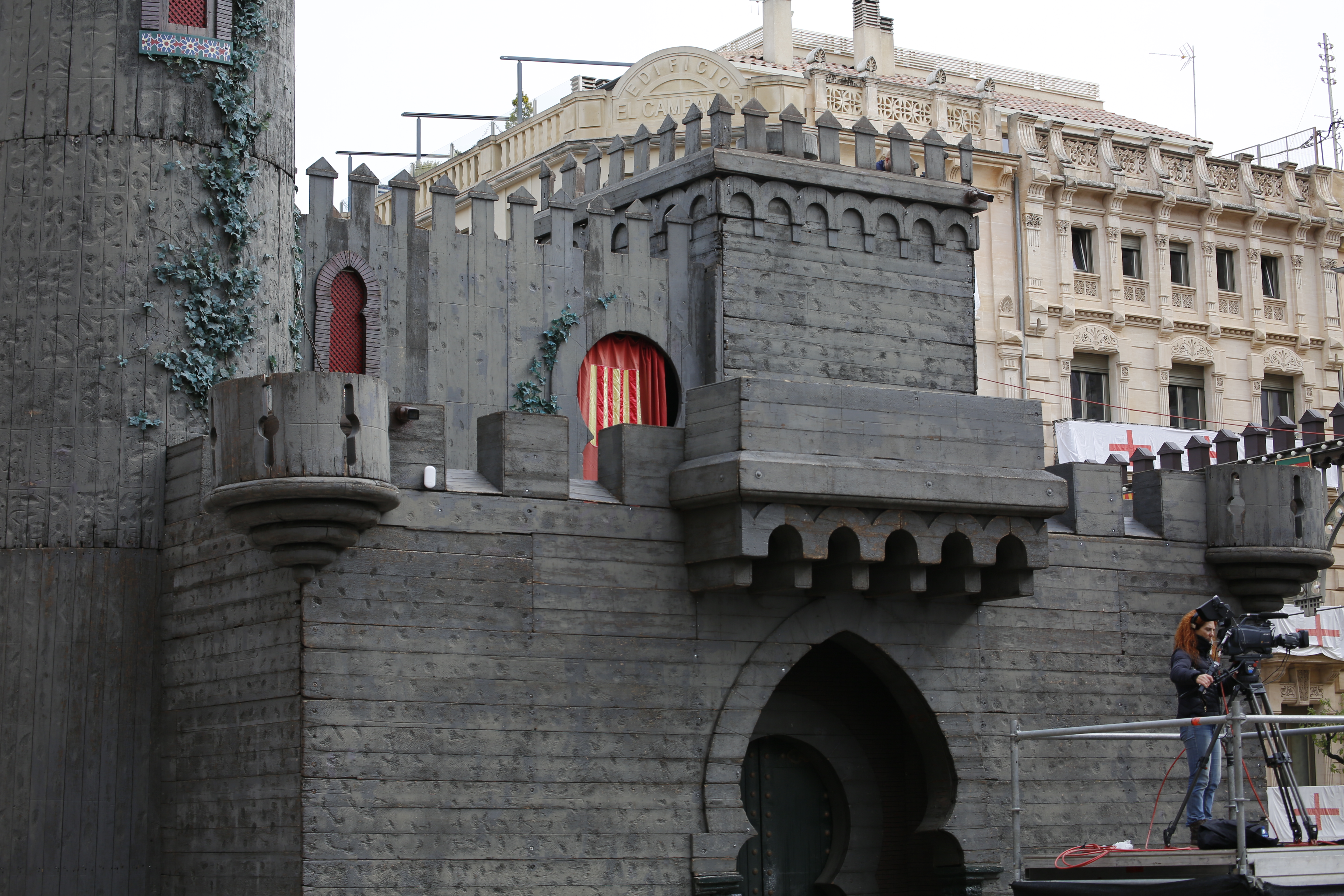 Scenographic castle for the Moors and Christians festival in Alcoy with TV crew covering the alardo